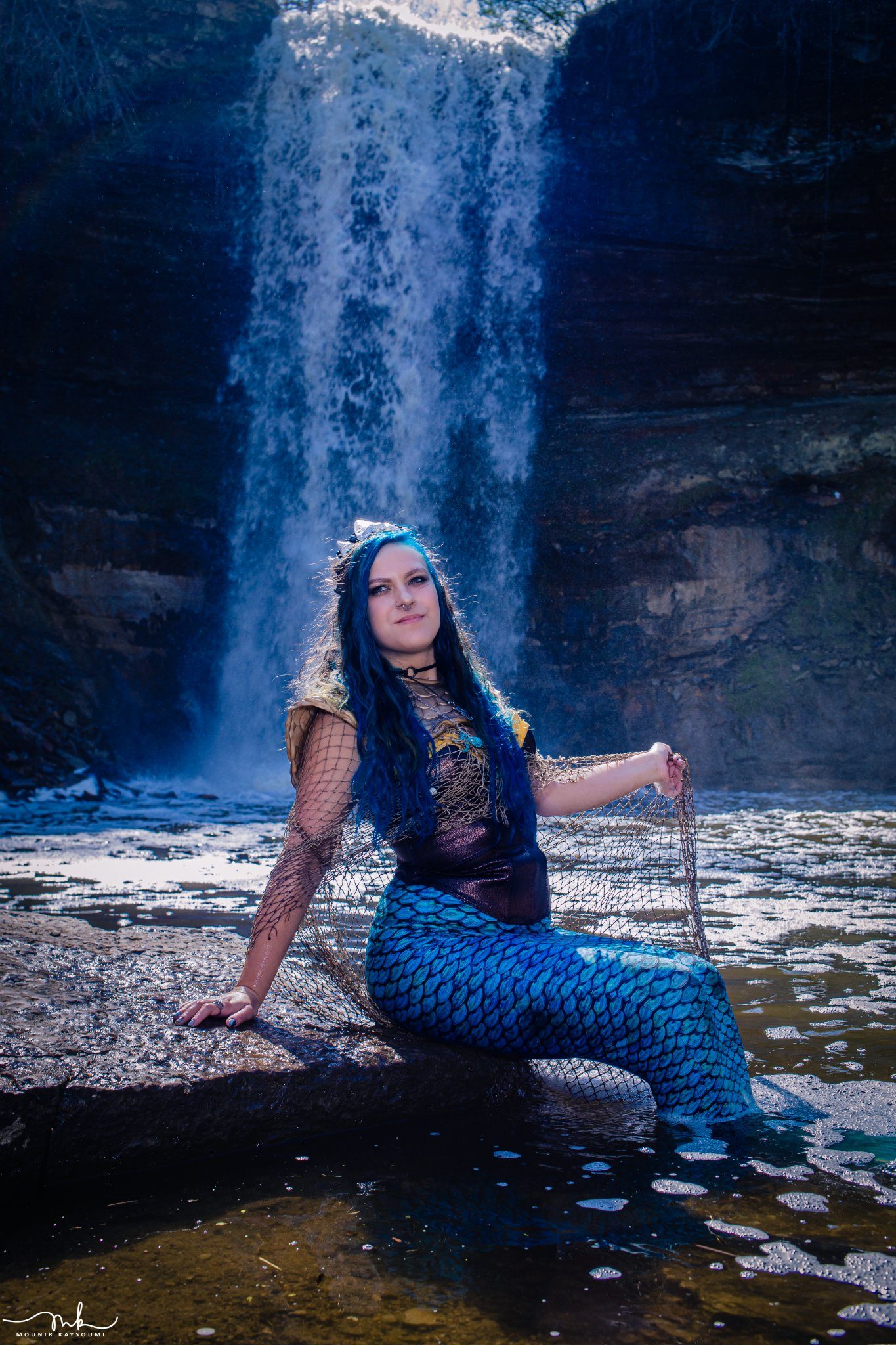 Fantasy portrait by a waterfall