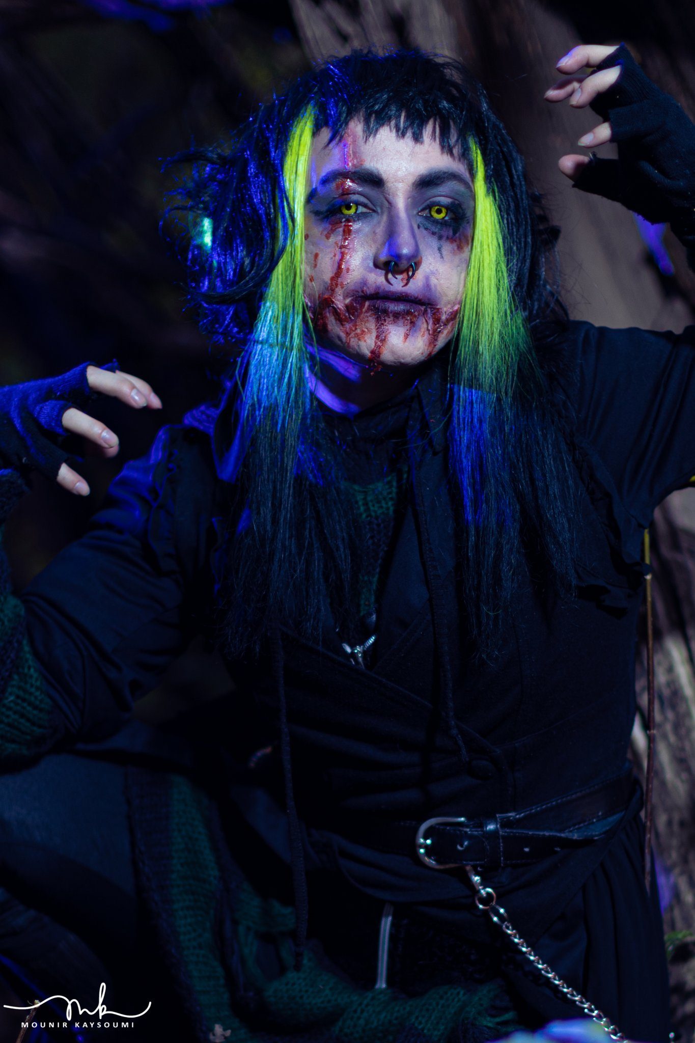 Blue-lit fantasy performer