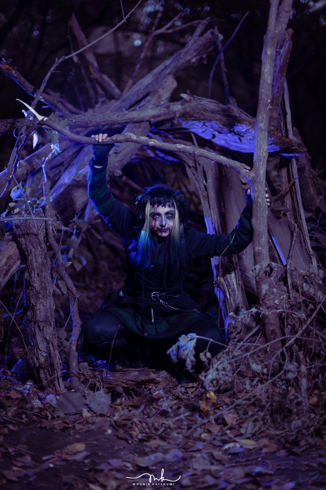 Performer under blue stage light