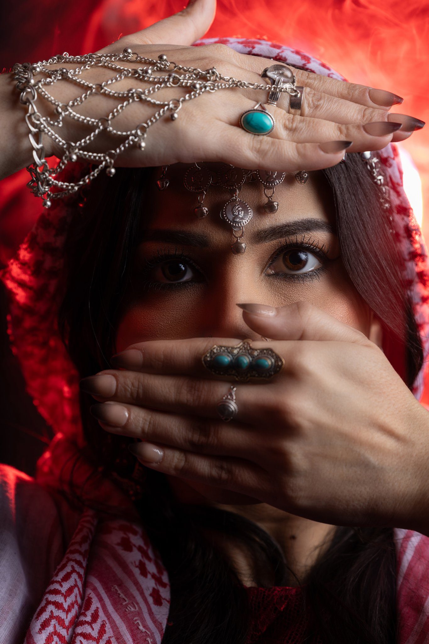 Moody red portrait with hands
