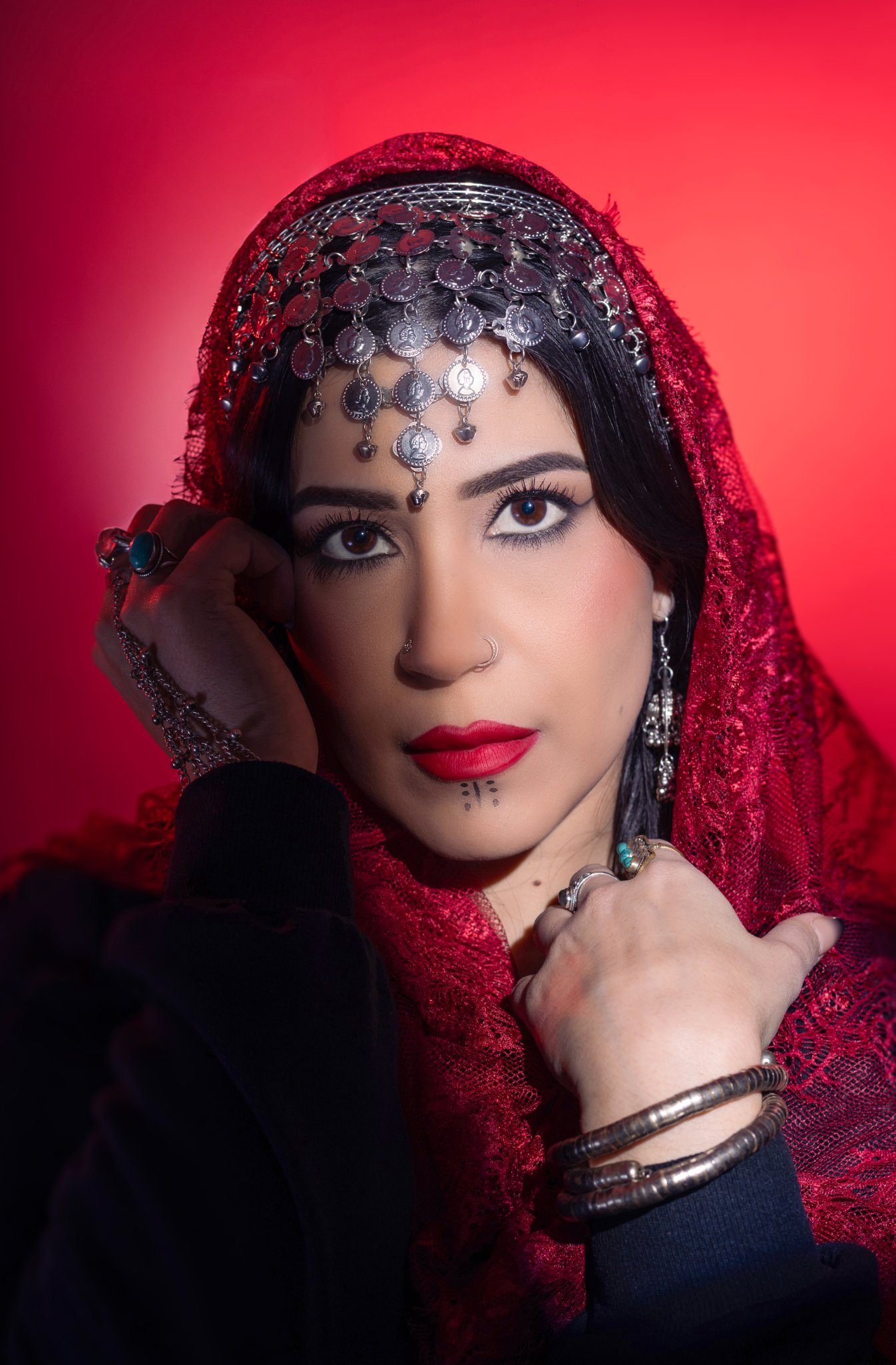 Woman in red veil